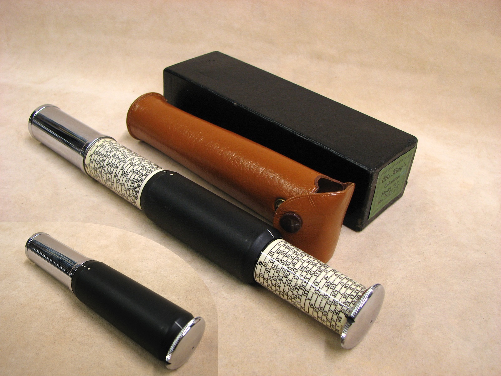 1960's Otis King Model L type C leather cased cylindrical slide rule calculator